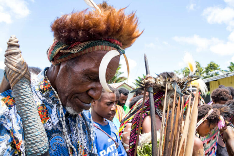 The Yali people pray and thank God for the Bible in their language.